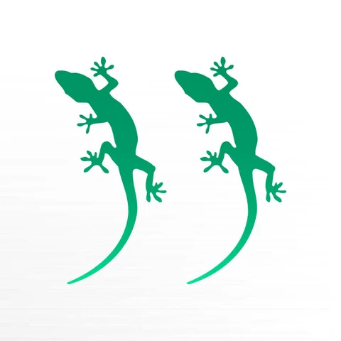 Twee gekko’s in groen